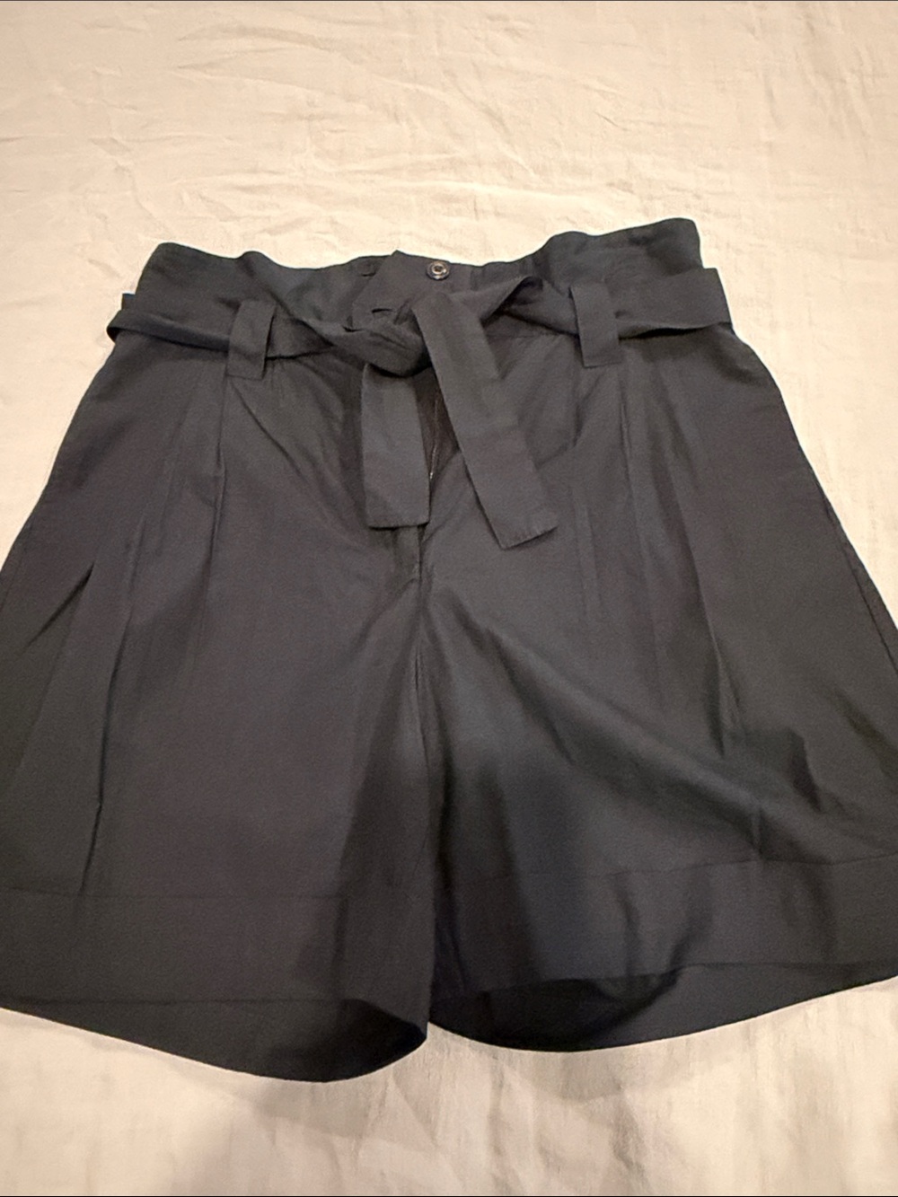 THE GREAT. High-Waist Pleated Tie Shorts - Black